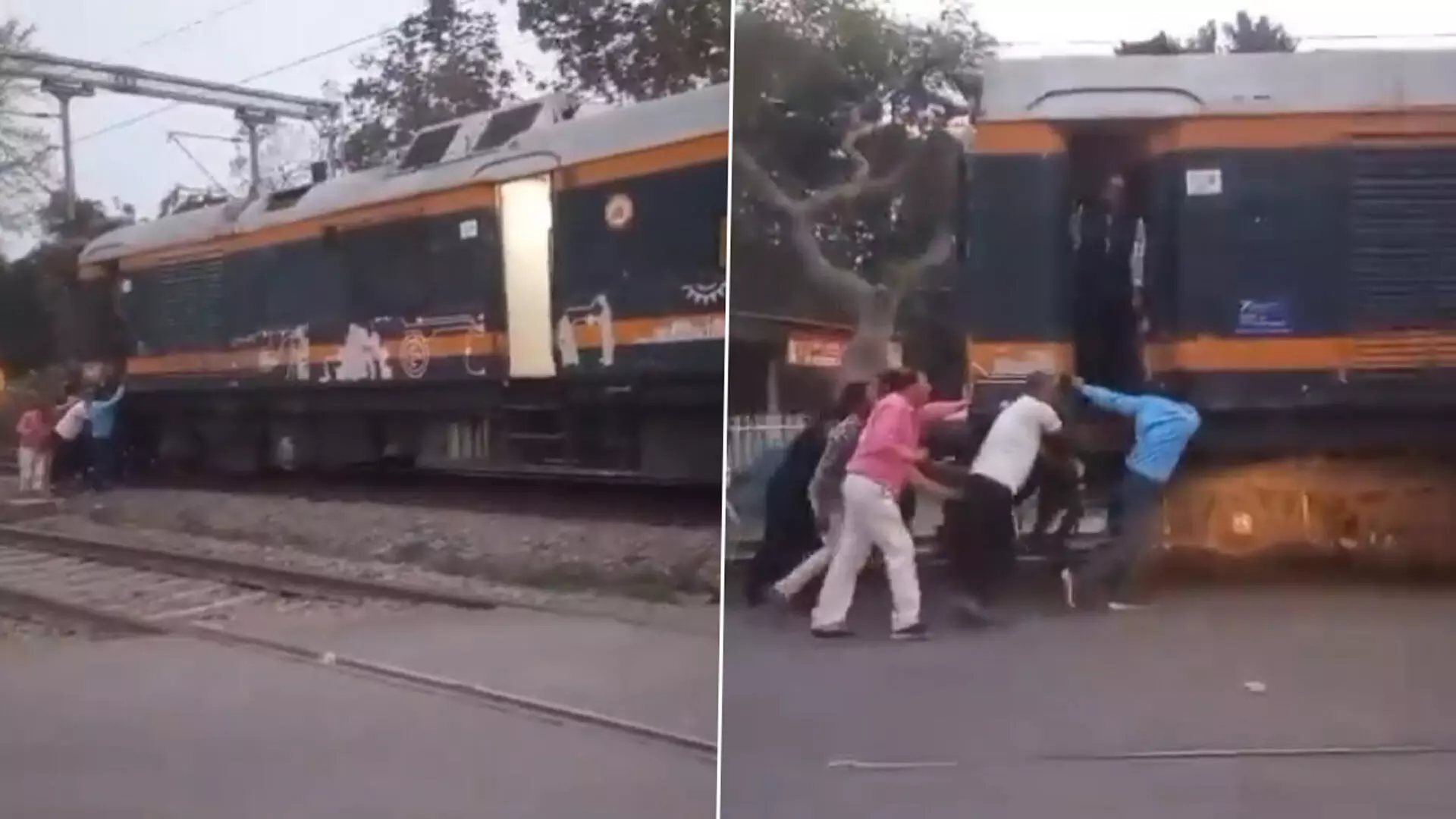 यूपी के अमेठी में ट्रेन खराब होने पर रेलवे कर्मचारी उसे दे रहे धक्का
