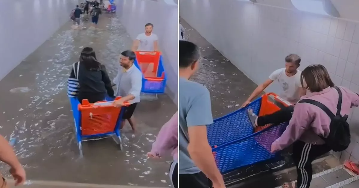 दुबई में बारिश के बीच बाढ़ वाले मेट्रो से गुजरने के लिए निवासियों ने शॉपिंग कार्ट का सहारा लिया