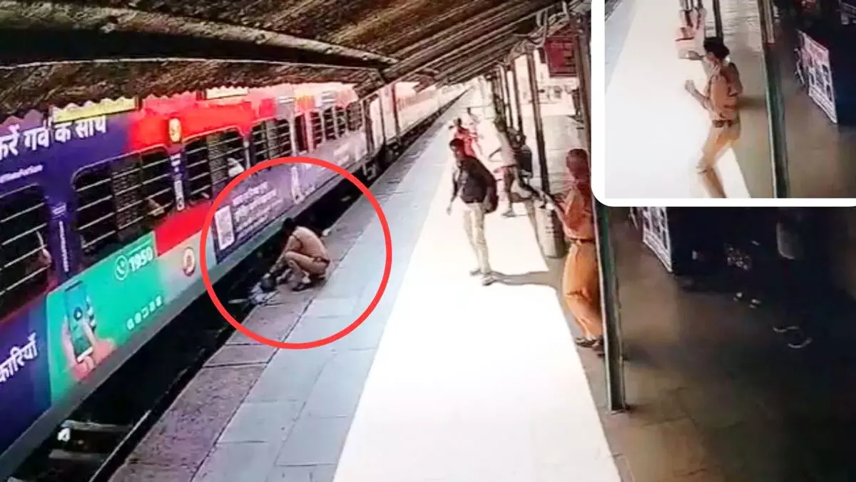 चलती ट्रेन में चढ़ते समय गिरा युवक, महिला कांस्टेबल ने बचाई जान
