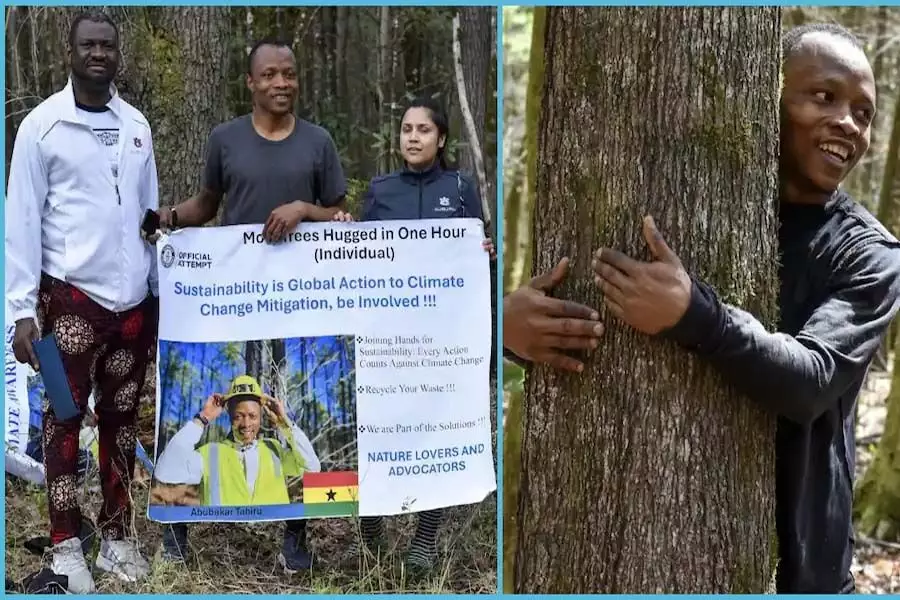 घाना के एक व्यक्ति ने एक घंटे में सर्वाधिक पेड़ों को गले लगाने का विश्व रिकॉर्ड बनाया