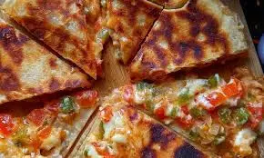 Pizza Paratha : घर पर बनाएं पिज़्ज़ा पराठा