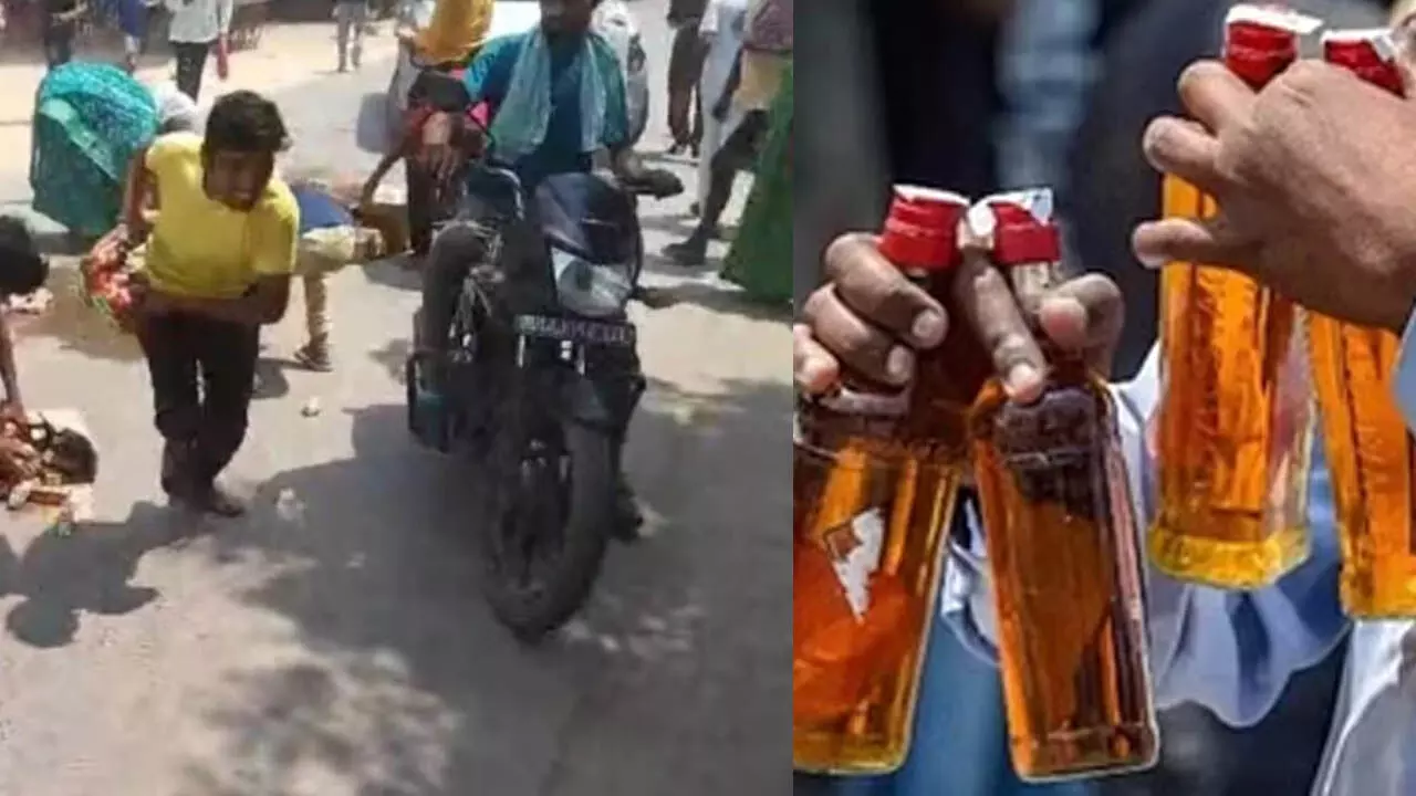 Agra: एक डिलीवरी वाहन से बिखरी हुई देशी शराब पर भीड़ टूट पड़ी