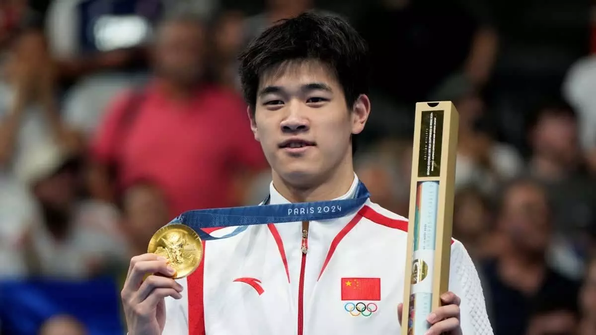 Chinese Swimmer ने अपना ही रिकॉर्ड तोड़कर ओलंपिक स्वर्ण जीता