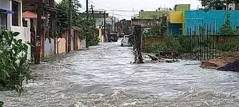 Dhanbad:  मुश्लाधार बारिश, घरों और दुकानों में घुसा पानी
