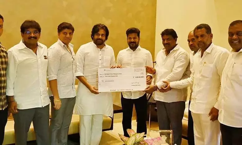 Pawan Kalyan ने तेलंगाना के सीएम रेवंत को 1 करोड़ रुपये का चेक सौंपा