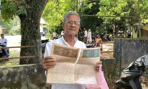 Assam : पूर्व छात्र नेता द्वारा जमीन पर कब्जे के बाद सेवानिवृत्त शिक्षक ने न्याय की मांग की