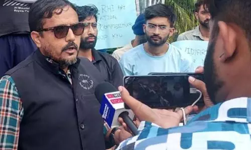 विकास ने MCC उल्लंघन के लिए JU अधिकारियों के खिलाफ कार्रवाई की मांग की