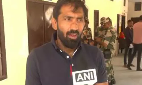 वोट डालने के बाद योगेश्वर दत्त ने कहा- Haryana को आगे ले जाने के लिए वोट करें