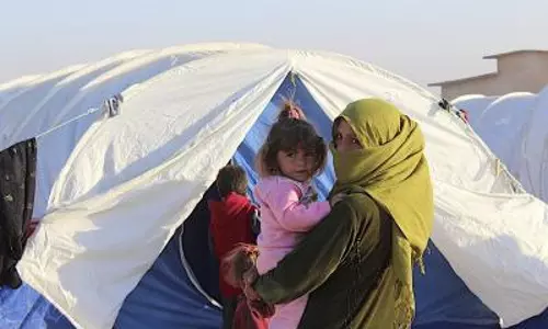 Syria के असद और जॉर्डन के विदेश मंत्री ने शरणार्थियों की वापसी पर चर्चा की