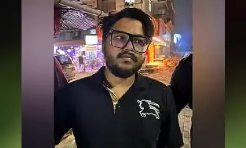 Assam : डीबी स्टॉक घोटाले के मुख्य संदिग्ध दीपांकर बर्मन को गुवाहाटी लाया गया