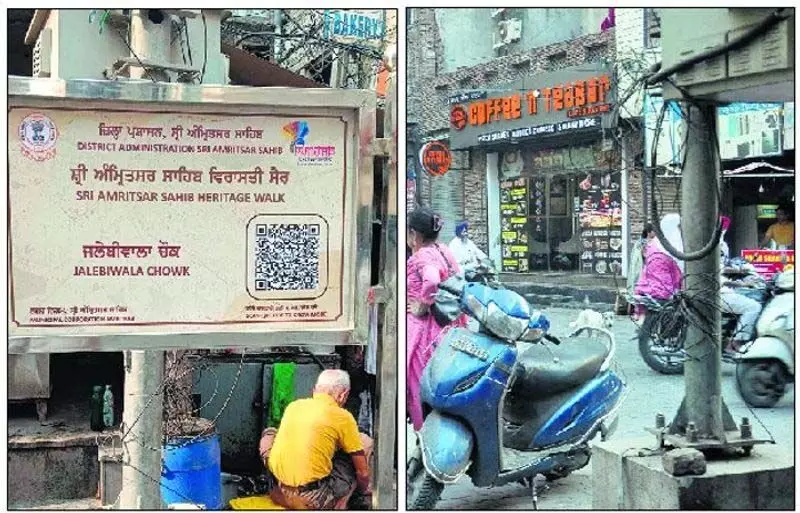 हेरिटेज स्ट्रीट पर Amritsar जिला प्रशासन के साइनबोर्ड पर राजनीतिक टिप्पणियां