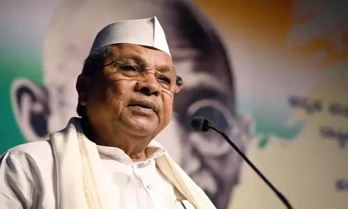 Karnataka: मोदी और उनकी नीतियों की आलोचना करने पर निशाना