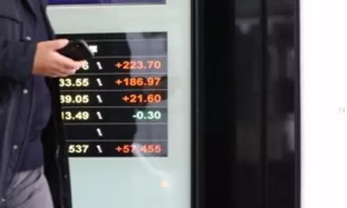 Japan PM के चुनाव से पहले सतर्कता के बीच टोक्यो के शेयर बाजार में मिलाजुला रुख रहा