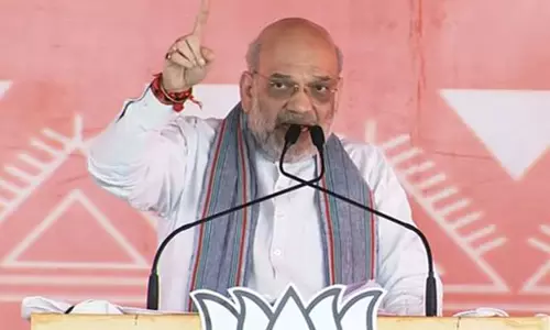 अमित शाह ने आदिवासियों को गुमराह करने के लिए JMM और कांग्रेस की आलोचना की