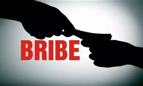 Assam : शोक संतप्त पिता ने पोस्टमार्टम रिपोर्ट के लिए डॉक्टरों पर रिश्वत लेने का आरोप