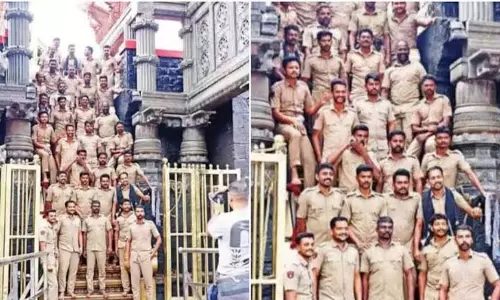 सबरीमाला सन्निधानम की 18वीं सीढ़ी पर फोटोशूट: पुलिसकर्मियों पर कार्रवाई सबरीमाला सन्निधानम की 18वीं सीढ़ी पर फोटोशूट: पुलिसकर्मियों पर कार्रवाई
