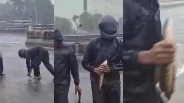 हिलती चेन्नई.. GST रोड पर मछली पकड़ता पुलिसकर्मी हिलती चेन्नई.. GST रोड पर मछली पकड़ता पुलिसकर्मी
