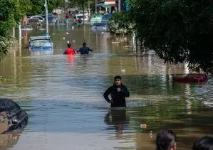 Malaysia: बाढ़ में छह लोगों की मौत, 130,000 लोग विस्थापित