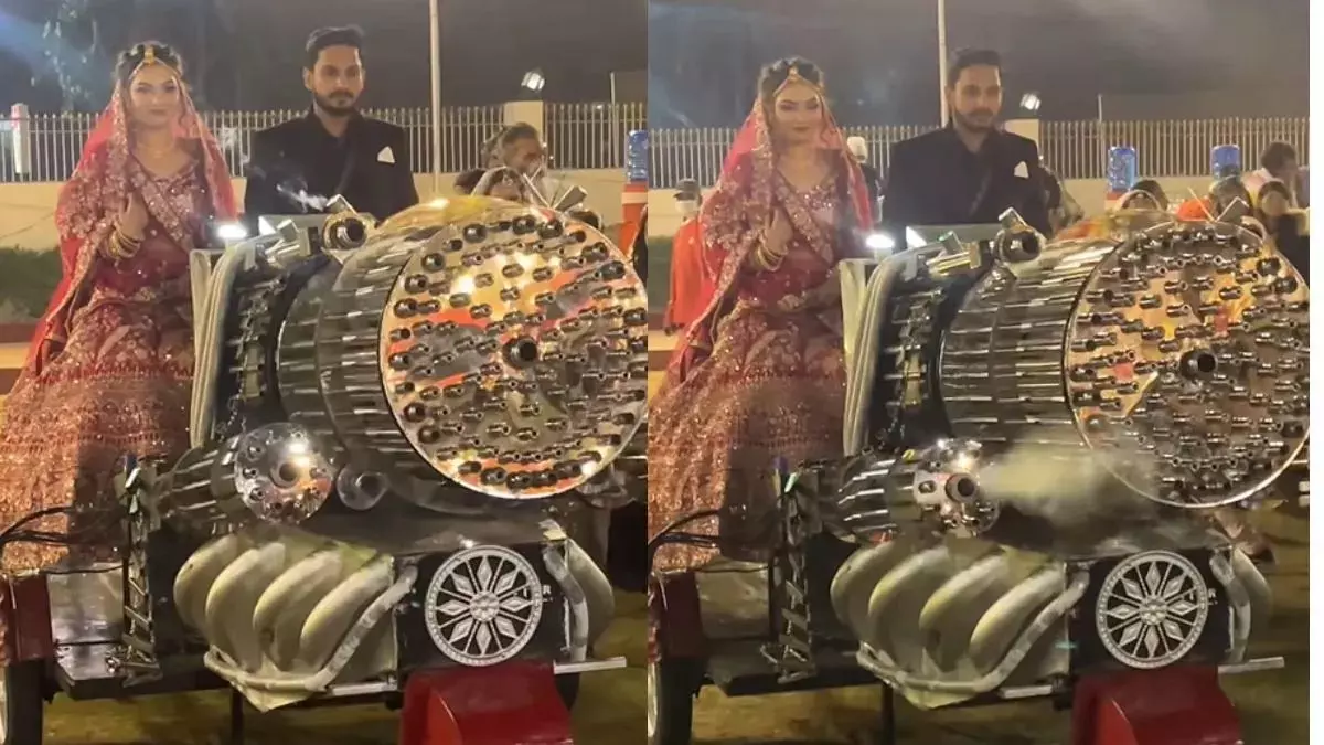 Animal-मशीन गन पर शादी जोड़े ने की एंट्री, लोगों ने खूब की खिंचाई, video viral Animal-मशीन गन पर शादी जोड़े ने की एंट्री, लोगों ने खूब की खिंचाई, video viral