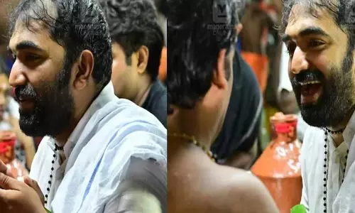 Kerala :  कांग्रेस विधायक चांडी ओमन ने सबरीमाला मंदिर में पूजा की