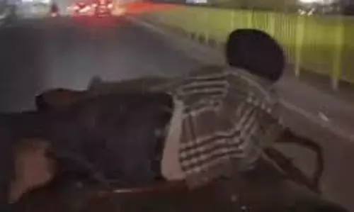 Mohali: खुली जीप पर स्टंट करने वाले युवक पर पुलिस ने की कार्रवाई
