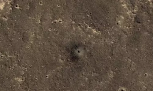 NASA के मंगल ग्रह यान ने कक्षा से धूल भरे, सेवानिवृत्त इनसाइट लैंडर NASA के मंगल ग्रह यान ने कक्षा से धूल भरे, सेवानिवृत्त इनसाइट लैंडर