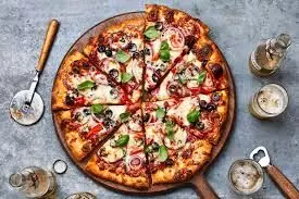 Tawa Pizza: तवे पर बना आसान टेस्टी पिज्जा, खिल उठेंगे बच्चों के चेहरे