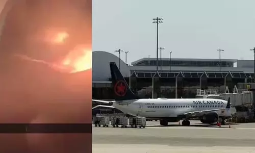 Canada: विमान क्षतिग्रस्त लैंडिंग गियर के साथ हैलिफैक्स में उतरा, VIDEO Canada: विमान क्षतिग्रस्त लैंडिंग गियर के साथ हैलिफैक्स में उतरा, VIDEO