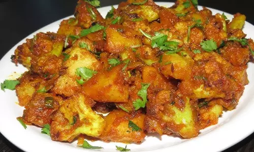 स्मोकी कैम्पफायर फूलगोभी फोंडू रेसिपी स्मोकी कैम्पफायर फूलगोभी फोंडू रेसिपी