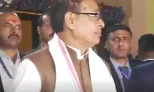 Assam : केंद्रीय मंत्री चौहान ने 650 करोड़ की परियोजना के तहत 50 हजार घरों का उद्घाटन किया