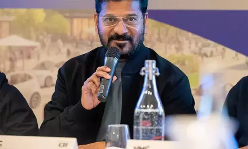 Revanth Reddy: दावोस में 10 कंपनियों के साथ समझौता
