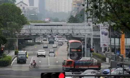 Singapore ने 2020 के बाद पहली बार मौद्रिक नीति में ढील दी