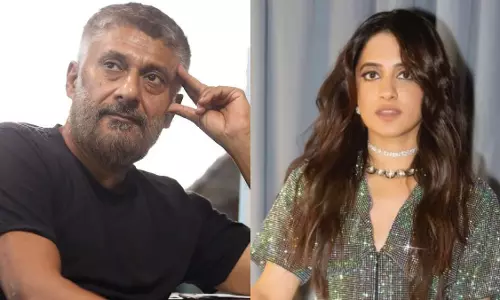 Vivek Agnihotri ने कोल्डप्ले कॉन्सर्ट में गायिका जसलीन रॉयल के प्रदर्शन की आलोचना की