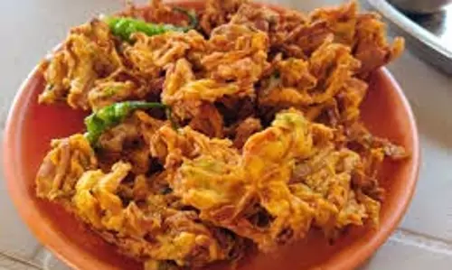 Recipe: ट्राई करें पत्तागोभी क्रिस्पी  पकौड़ी , मिलेगा लाजवाब स्वाद