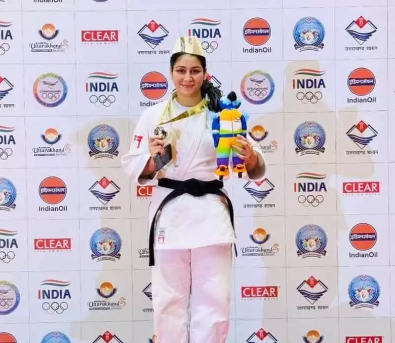 Judoka Isrop ने राष्ट्रीय खेलों में स्वर्ण पदक जीता