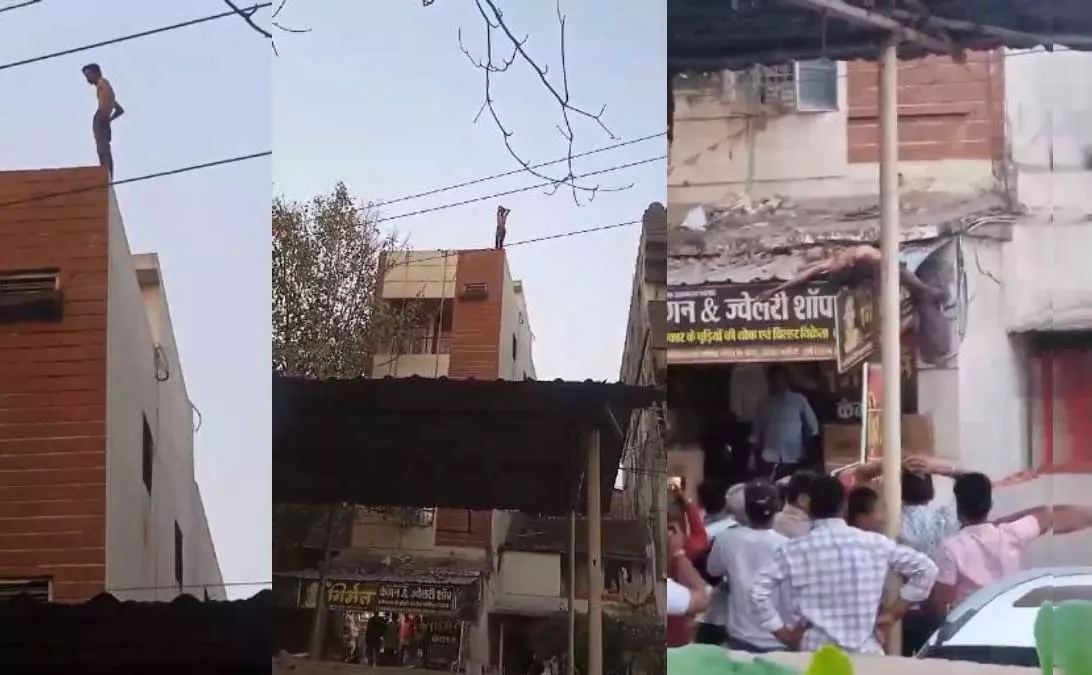 युवक ने 3 मंजिला ईमारत से लगाई छलांग, वीडियो वायरल युवक ने 3 मंजिला ईमारत से लगाई छलांग, वीडियो वायरल