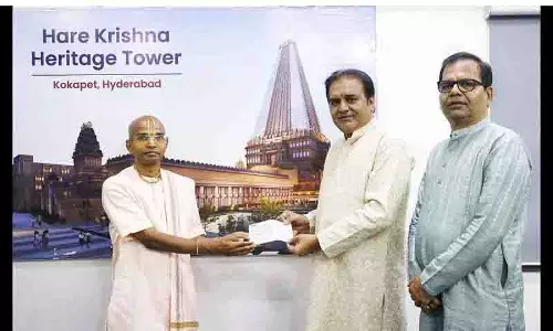Shri Narsingh क्लॉथ एम्पोरियम द्वारा हरे कृष्ण हेरिटेज टॉवर परियोजना को दान