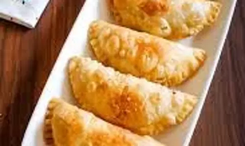 Gujiya Recipe: कुरकुरी और मीठी गुजिया बनाने का शानदार तरीका