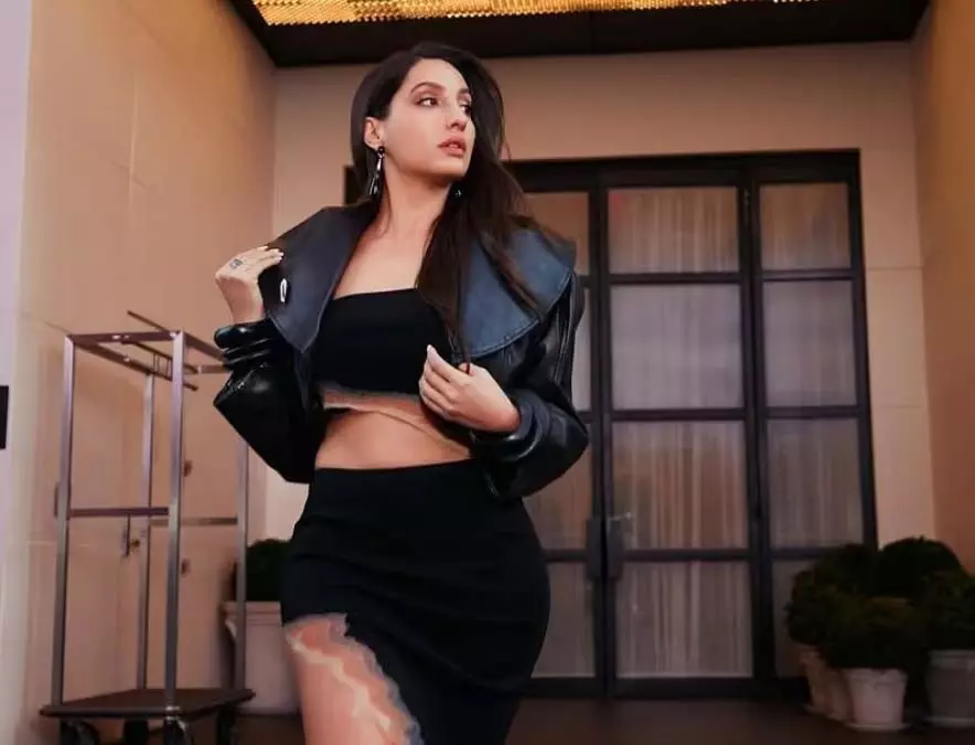Nora Fatehi का ग्लैमरस लुक, फिल्म प्रमोशन में ढाया कहर! Nora Fatehi का ग्लैमरस लुक, फिल्म प्रमोशन में ढाया कहर!