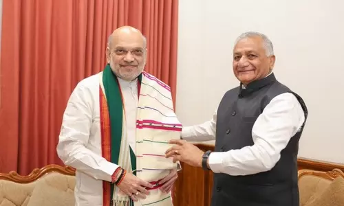 केंद्रीय गृह मंत्री अमित शाह ने आइजोल में मिजोरम के राज्यपाल VK सिंह से मुलाकात की