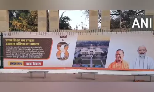 CM के तौर पर योगी आदित्यनाथ के 8 साल पूरे होने पर लखनऊ में पोस्टर लगाया गया
