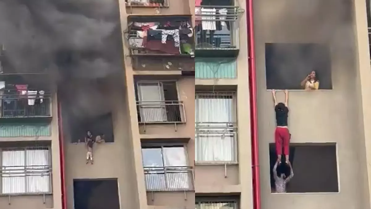अहमदाबाद बिल्डिंग में आग: जान पर खेलकर बच्चों को बचाती माँ का VIDEO आया सामने अहमदाबाद बिल्डिंग में आग: जान पर खेलकर बच्चों को बचाती माँ का VIDEO आया सामने