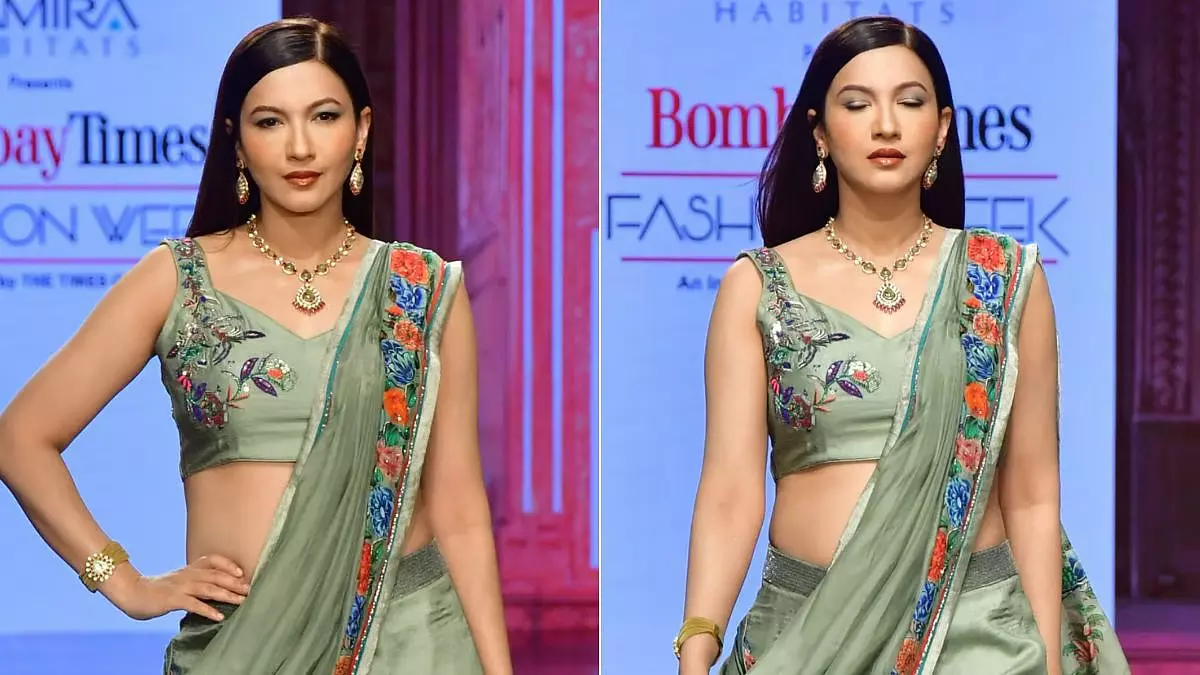 गौहर खान ने रैंप वॉक करते हुए बेबी बंप फ्लॉन्ट किया गौहर खान ने रैंप वॉक करते हुए बेबी बंप फ्लॉन्ट किया