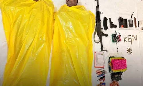AK 47 और दो नक्सलियों के शव बरामद