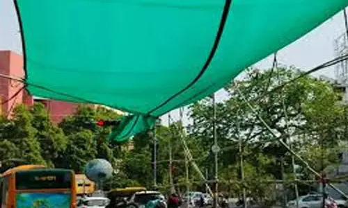 यातायात विभाग ने रिजर्व बैंक चौराहे पर ग्रीन शेड लगाया