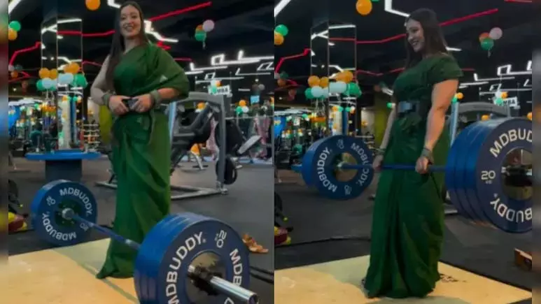 महिला ने साड़ी पहन किया वेट लिफ्टिंग, VIDEO देख लोग हुए हैरान महिला ने साड़ी पहन किया वेट लिफ्टिंग, VIDEO देख लोग हुए हैरान