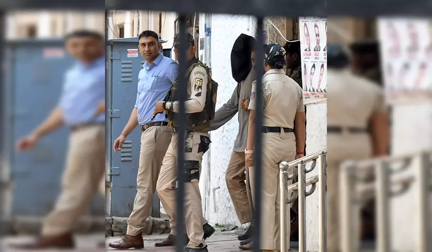 तहव्वुर राणा के वॉयस सैंपल और लिखावट के नमूने लेगी एनआईए, पटियाला हाउस कोर्ट ने दी मंजूरी तहव्वुर राणा के वॉयस सैंपल और लिखावट के नमूने लेगी एनआईए, पटियाला हाउस कोर्ट ने दी मंजूरी
