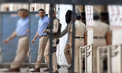 तहव्वुर राणा के वॉयस सैंपल और लिखावट के नमूने लेगी एनआईए, पटियाला हाउस कोर्ट ने दी मंजूरी तहव्वुर राणा के वॉयस सैंपल और लिखावट के नमूने लेगी एनआईए, पटियाला हाउस कोर्ट ने दी मंजूरी