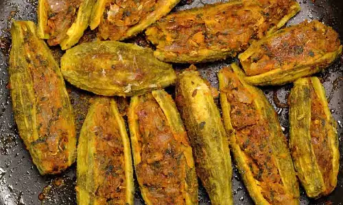 Recipe: इस विधि से बनाएं टेस्टी भरवां करेला Recipe: इस विधि से बनाएं टेस्टी भरवां करेला