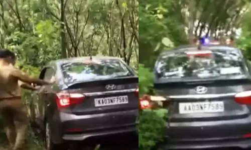 पहाड़ी पर फंस गई कार; अंततः अग्निशमन विभाग को बचा लिया गया